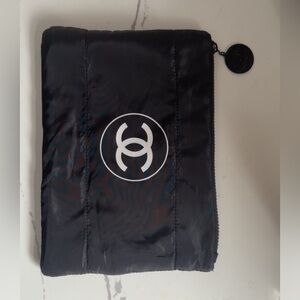 CHANEL Black Quilted Toiletry Pouch with White Logo